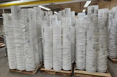 Used plastic buckets stacked in a warehouse — used buckets wholesale